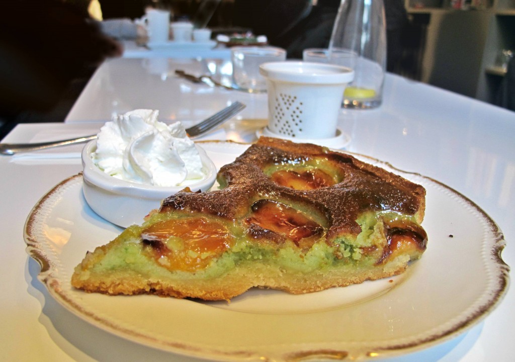 A huge piece of apricot tart with pistachio.